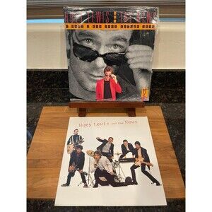 2 vintage vinyls of Huey Lewis and the news